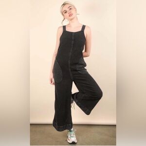 Boutique NWT Size Small Washed Black Jumpsuit with patch pockets and tie back